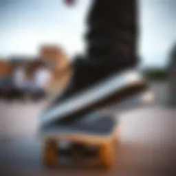 Stylish all-black Etnies shoes on a skateboard