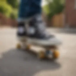A close-up of Chuck Taylor All Star shoes on a skateboard