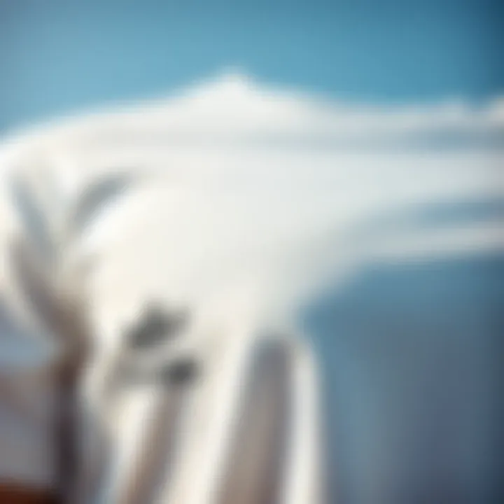 A Closer Look at Fabric Quality Close-up of the fabric texture of adidas white t-shirts.