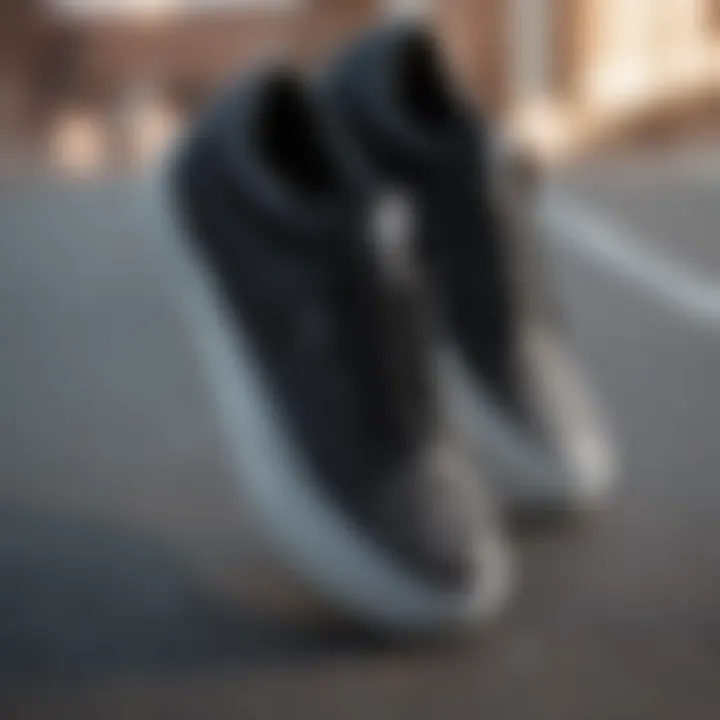 Close-up of black low Vans showcasing the intricate design and texture.