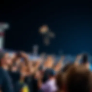 Thrilling Audience Experience at Nitro Circus Audience cheering and experiencing the thrill of Nitro Circus