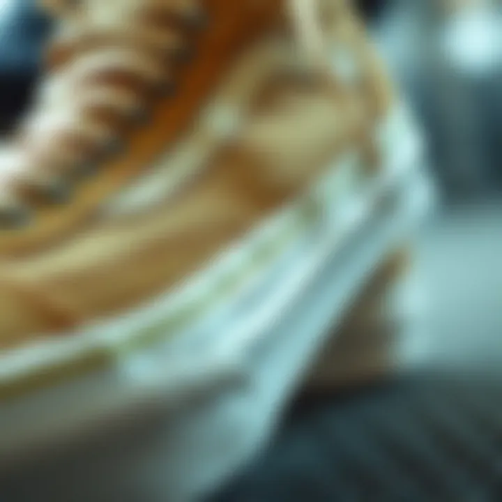 Close-up of Vans Old Skool Beige Suede detailing and stitching