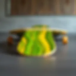 The elegant design of the Arbor Drop Deck Longboard showcasing its sleek lines and vibrant colors.