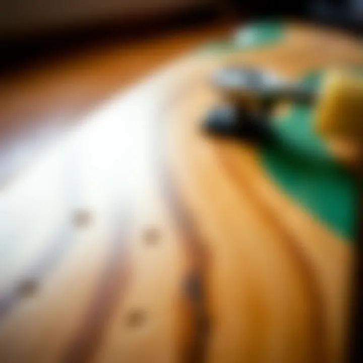A close-up view of the materials used in the Arbor Drop Deck Longboard, highlighting craftsmanship and durability.