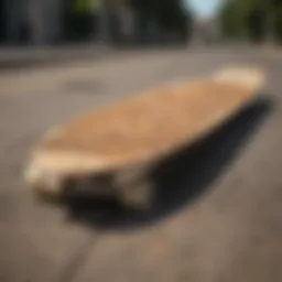 A close-up view showcasing the intricate design of a leaf longboard deck.