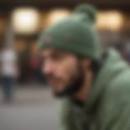 Sage green beanie worn during a skateboarding session