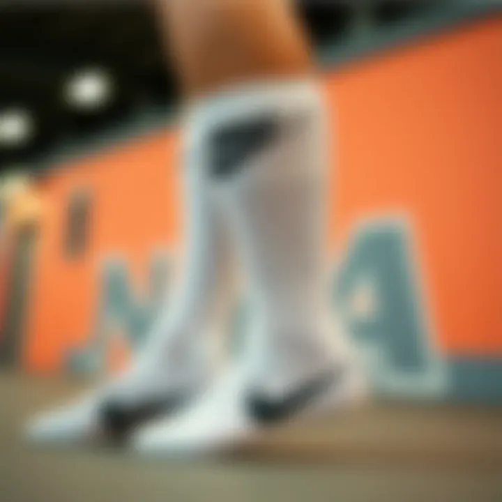 Fashion Meets Function: Nike High Socks with Athletic Gear A fashionable display of Nike high socks paired with athletic gear