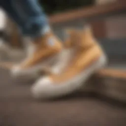 A close-up shot of tan platform Converse sneakers on a skateboard.