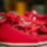 Close-up of red leather Vans showcasing their craftsmanship and unique texture