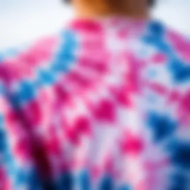 Intricate Tie Dye Details Close-up of the intricate tie dye patterns of a pink and blue shirt