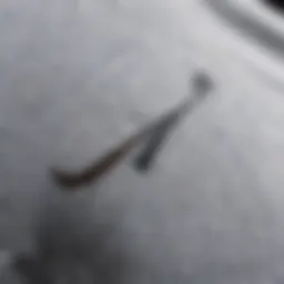 Close-up of the Nike Swoosh long sleeve shirt showcasing intricate stitching
