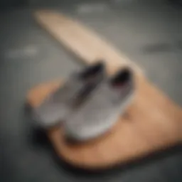 Vans slip-on checkerboard shoes resting on a skateboard deck