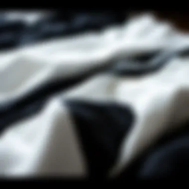 Diverse Fabrics for Timeless Pants An array of fabrics showcasing the material choices for black and white pants.