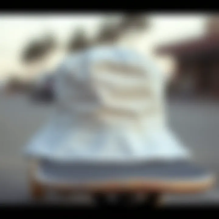 White Bucket Hat on a Skateboard Close-up of a white bucket hat placed on a skateboard