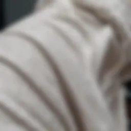 A close-up view of a white hoodie showcasing its texture and fabric
