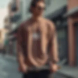 A stylish drop shoulder shirt displayed on a vintage skateboard.