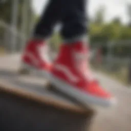 Vans red high tops on a skateboard