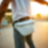 A stylish white fanny pack worn during a skateboarding session