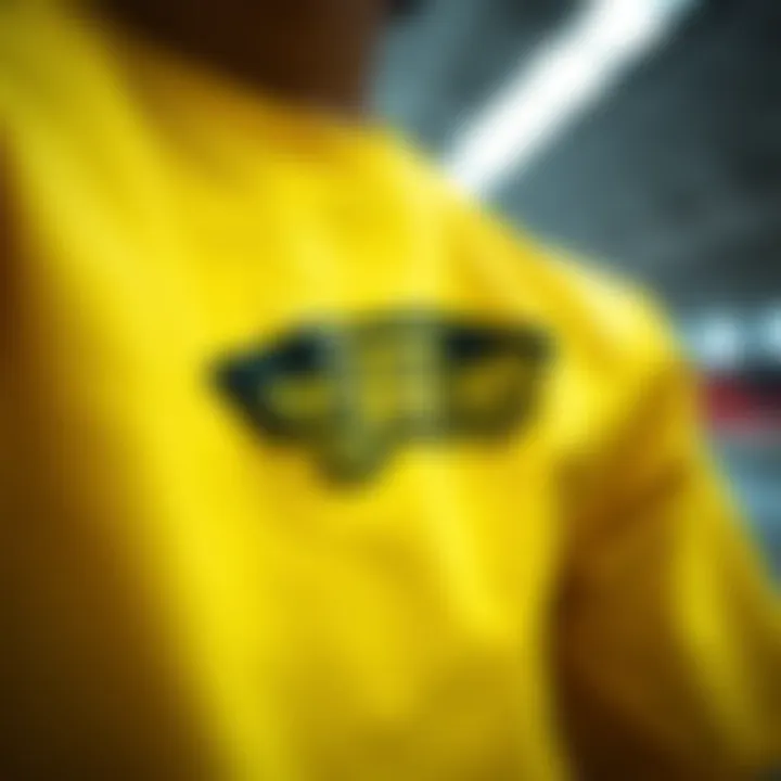 Close-up of the unique design elements on a yellow Vans t-shirt